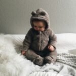 Baby in a bear onesie